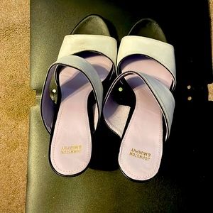 Johnson and Murphy black ledge sandals with white straps